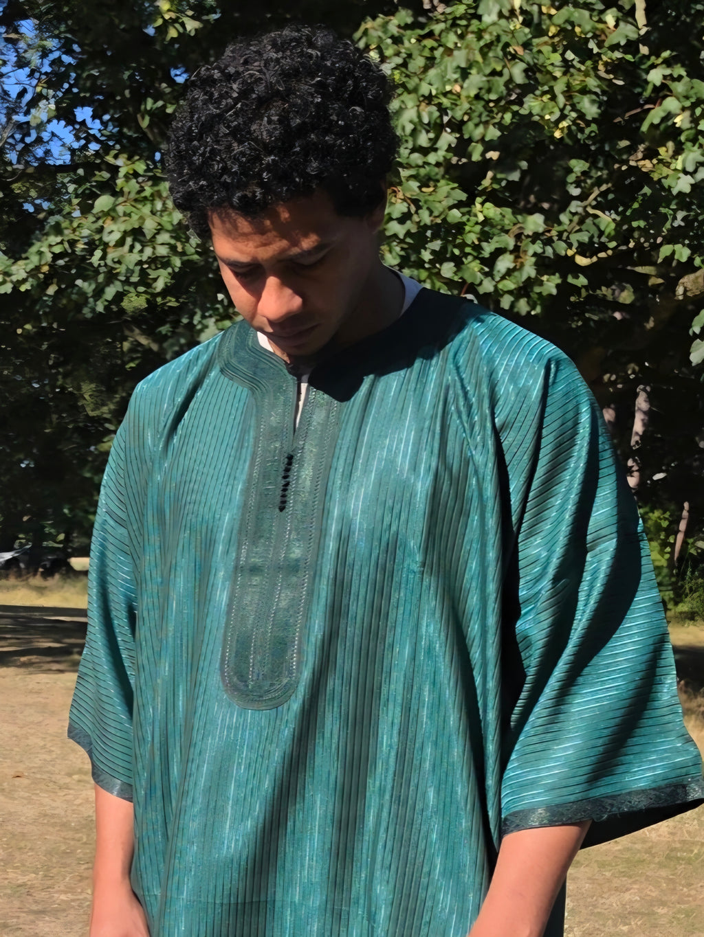 Close-up of the forest green Gandoura fabric texture